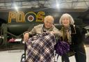 Stuart Black with wife Crystal next to a Lancaster bomber at RAF Museum London