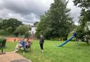 Children's play equipment outside Fortis Green Tennis Club's clubhouse