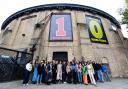 Some of the young people who have benefitted from the Roundhouse's creative programmes gathered outside the Chalk Farm venue to celebrate