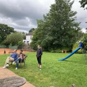 Children's play equipment outside Fortis Green Tennis Club's clubhouse