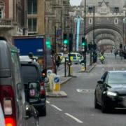 A woman has been taken to hospital following a crash on Tower Bridge.