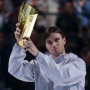 Jack Draper lifts the trophy after beating Karen Khachanov in Vienna (AP/Heinz-Peter Bader/PA)