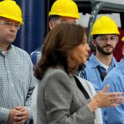 Employees listen as Democratic presidential nominee Vice President Kamala Harris speaks after touring the Hemlock Semiconductor Next-Generation Finishing facility in Hemlock, Michigan (Jacquelyn Martin/AP)