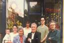 Four generations of the Moreno family have been involved in running their West Hampstead wine shop. Here Abbi Moreno is with her then-infant son Dillon, and family members Salome, Joy, Juan, Marcel and Manuel. Picture: Abbi Moreno