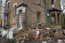 The demolition site in Willesden Lane where a worker was badly injured