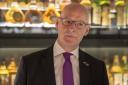 First Minister John Swinney during a visit to the Scotch Whisky Experience in Edinburgh