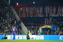 Crystal Palace's Daichi Kamada walks off the field after being shown a red card by referee Michael Salisbury for a foul on Fulham's Kenny Tete during the Premier League match at Selhurst Park, London. Picture date: Saturday November 9, 2024.