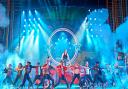 Paul French as Kenickie and the cast of Grease at The Dominion Theatre perform Greased Lightning