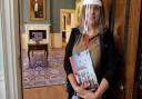 Maria Ioannou, a 'house explainer' at Kenwood House, at the door to Lord Mansfield's dressing room. Picture: Polly Hancock