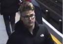 Police believe this man has information that may assist the investigation after a Camden tube station worker was injured stopping a fight