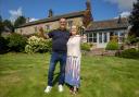 Eliza Yahioglu (right) and her husband Gokhan outside their new home