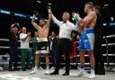 Florian Marku (left) celebrates victory against Dylan Moran at the AO Arena, Manchester Picture: PA