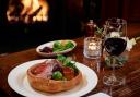 The new Sunday roast at The Great Central Pub at Marylebone's Landmark Hotel features a giant Yorkshire pudding filled with roast sirloin and  veg