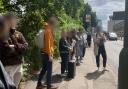 People patiently waiting for a replacement bus at Colindale Gardens on June 14 at 10.56am