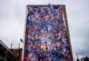 An abseiling team was called in to help erect the mural