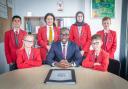 City of London Academy Highgate Hill head teacher Prince Gennuh and pupils celebrate the school’s new ‘good’ Ofsted rating. Image: Jamie Smith