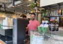 Alex Stone behind the counter at Trade Made in Swain's Lane