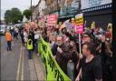 Anti-racist protestors line the street in North Finchley