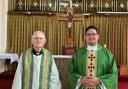 Fr Allan Alvarado Gill (right) with outgoing parish priest Fr John Deehan