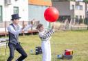 Sam the Juggler entertained the crowds at Tetherdown School's Annual Family Picnic (Image: Anna Gordon/Tetherdown School)