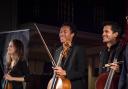 Music festival co-founders Natalie and Ashok Klouda with Sheku Kanneh-Mason, who performed at the wedding of Harry and Meghan in 2018.