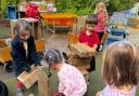 Children problem solving in the outdoor space at Tetherdown (Image: Tetherdown Primary School)