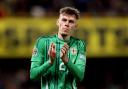 Conor Bradley applauds the Northern Ireland fans (Liam McBurney/PA)