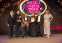 Namaaste Kitchen Chef Sabbir Karim and his wife Aneela proudly accept Best Restaurant of the Year Award