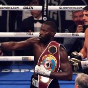 Lawrence Okolie (left) celebrates after retaining the WBO World Cruiserweight title belt after defeating Dilan Prasovic via Round 3 knockout at the Tottenham Hotspur Stadium.