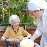 Britian's oldest Covid survivor Angela Hutor at her birthday celebration last year.