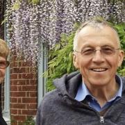 Malcolm and Linda Grove at their home in Belsize Lane under the wisteria they planted together.