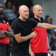 Hornchurch manager Mark Stimson (centre)