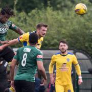 Ricardo Alexander-Greenaway, who sent off in the 2nd Half for two bookable offences, heads the ball forward for Hendon