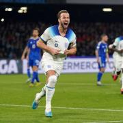 Harry Kane celebrates scoring his record-breaking 54th goal for England