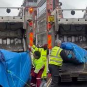 Camden Council's waste collectors were seen putting the tents in a truck (Image: Streets Kitchen/X)