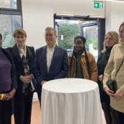 Sir Keir Starmer with guests at the launch of three housing  blocks in Haverstock