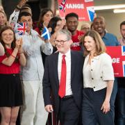 Labour leader Sir Keir Starmer and his wife Victoria Starmer greet Mayor of London Sadiq Khan at a watch party for the results of the 2024 General Election in central London, as the party appears on course for a landslide win