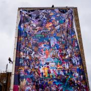 An abseiling team was called in to help erect the mural