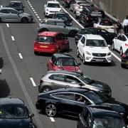 Police have arrested a man after a huge crash on the M1 which has caused severe delays and chaos