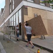 Windows being boarded up at Foxtons