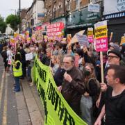 North Finchley community line the streets in a counter protest against far-right riots