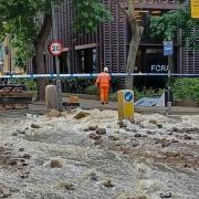 Workers at the scene in Pentonville Road in the early hours of August 18 after a water main burst