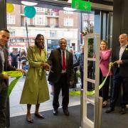 Waitrose chair Sharon White cut the ribbon with Calvin Raymond, who after 30 years is the store's longest serving partner