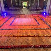 David's Labyrinth uses part of his 9000 strong collection of toy cars laid out in a rainbow of colours at St Jude's in Hampstead Garden Suburb