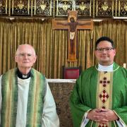 Fr Allan Alvarado Gill (right) with outgoing parish priest Fr John Deehan