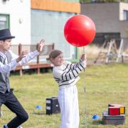 Sam the Juggler entertained the crowds at Tetherdown School's Annual Family Picnic (Image: Anna Gordon/Tetherdown School)