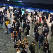 A view of the concourse at Euston train station in north London, where Network Rail switched off the large advertising board following criticism