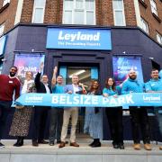 Mayor of Camden, Councillor Samata Khatoon cuts the ribbon with Leyland CEO Martin Hastings and other members of the Leyland team