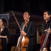 Music festival co-founders Natalie and Ashok Klouda with Sheku Kanneh-Mason, who performed at the wedding of Harry and Meghan in 2018.