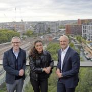 Councillor Nasrine Djemai, (centre), John Mulryan, Managing Director Ballymore (left) and Rob Beacroft, Lateral Co-Founder (right) in front of the Camley Street site